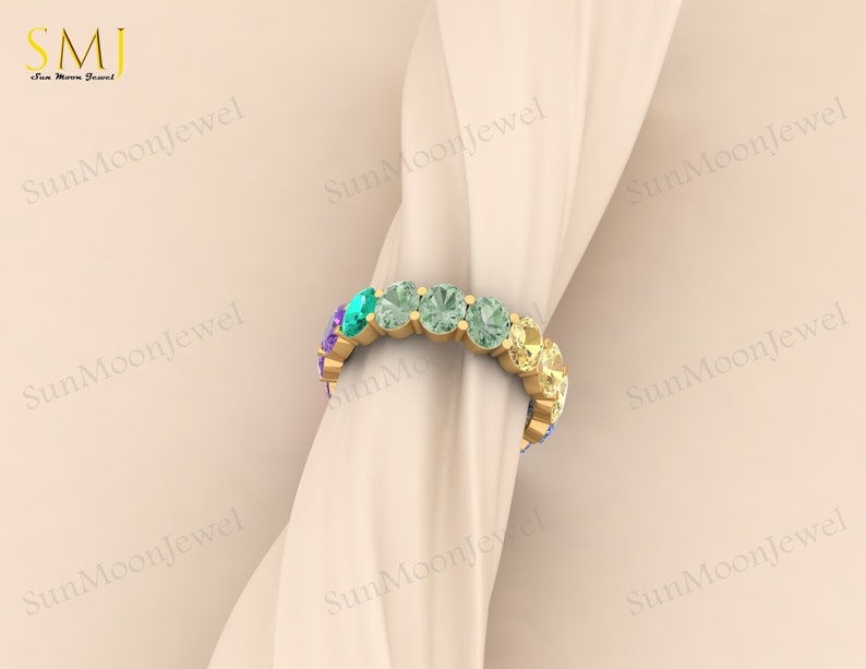 Multi sapphire oval shape wedding band with rainbow sapphires, available in 14k gold or sterling silver. 3