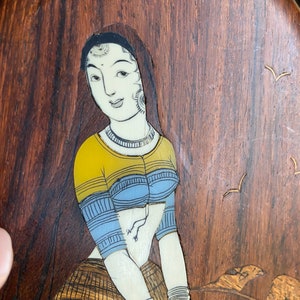 Vintage oval wood plaque with Indian? girl and lambs