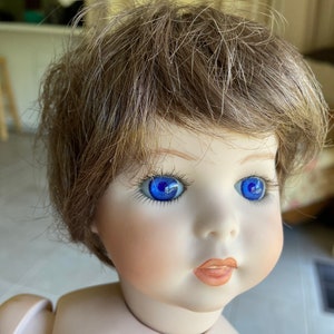 Vintage EMK bisque doll