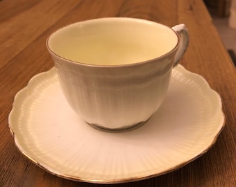 Vintage Pale yellow cup and saucer