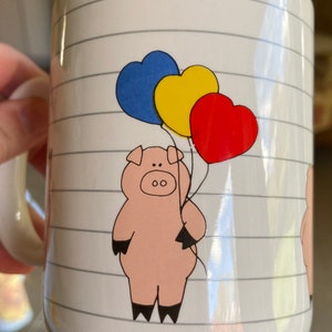 Vintage pig with balloons ceramic mug