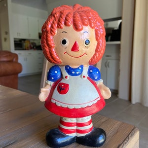 Vintage Raggedy Ann chalkware coin bank