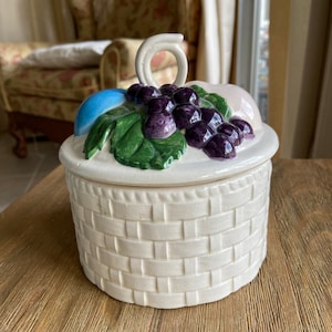 Vintage jar with lid with fruits