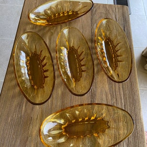 Vintage yellow glass elongated bowls