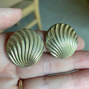 Vintage round metal clip on earrings