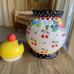 Vintage Mary Engelbreit jar with cherry lid