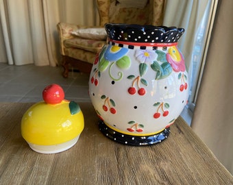 Vintage Mary Engelbreit jar with cherry lid