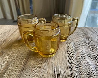 Vintage amber glass barrel shot glasses