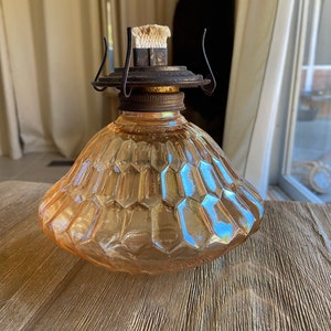 Vintage orange glass oil lamp