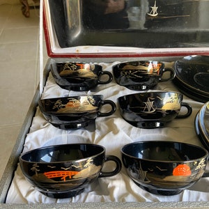 Vintage Asian lacquered cups,saucers,spoons and tray in original box
