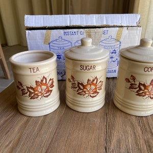Vintage coffee tea and sugar canisters