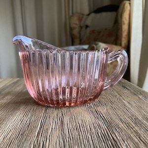 Vintage pressed pink glass creamer