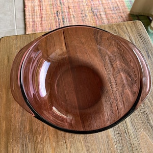 Vintage purple cranberry Pyrex bowl with handles