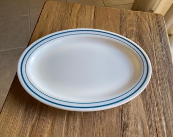 Vintage Pyrex 12 inch white platter with blue rim