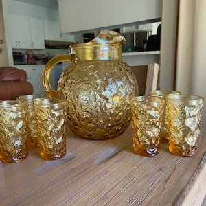 Vintage yellow glass pitcher with 6 juice glasses