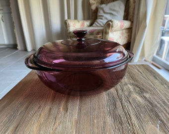 Vintage Cranberry Pyrex bowl with lid