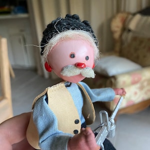 Vintage old man figurine