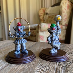 Vintage pewter clown figurines