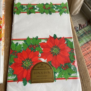 Vintage Hallmark paper tablecloths (Christmas and Thanksgiving) sealed