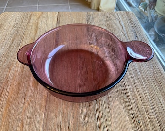 Vintage amethyst glass Corning bowl with handle
