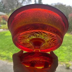 May include: A set of three ceramic mugs with a speckled, matte finish. The mugs are in shades of cream, light gray, and dark gray. Each mug has a simple, minimalist design, perfect for coffee or tea.