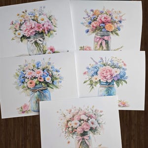 May include: Five white cards with watercolor illustrations of bouquets of flowers in mason jars. The flowers are pink, blue, and white.