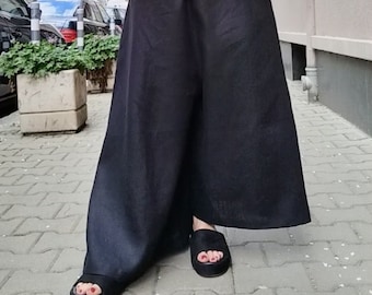 Linen Hight-waisted tailored wide-leg pants in black with pockets , Asymmetric long and short legs