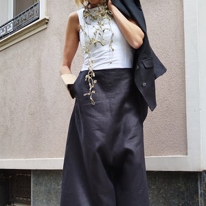 Linen Hight-waisted tailored wide-leg pants in black with pockets , Asymmetric long and short legs