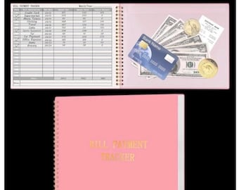 May include: A pink spiral bound bill payment tracker with a clear plastic pocket on the front cover. The pocket contains cash, a credit card, and a receipt. The front cover has the words "BILL PAYMENT TRACKER" in gold lettering.