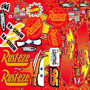 May include: A red sticker sheet featuring Lightning McQueen graphics, including the number 95, Rust-eze logos, blue eyes, lightning bolts, and the text KA-CHOW. The design includes various racing-themed decals with yellow, orange, and white accents.