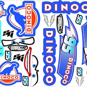 May include: A sheet of stickers featuring designs from the movie Cars. The stickers include the Dinoco logo, Lightning McQueen's eyes, the number 95, and the text "Lightning McQueen". The stickers are in blue, red, and white.
