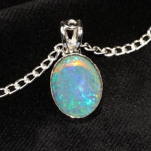 Vintage Fire Opal Pendant Necklace: 13.50 Crt Oval Ethiopian Opal, Sterling Silver Chain.
