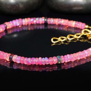 Fire Opal Beaded Bracelet: AAA Ethiopian Rondelle Gemstone.