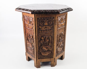 Mesa de madera tribal tallada a mano: pieza de almacenamiento bohemia octagonal