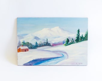 Pintura vintage de paisaje nevado sobre madera: Escena invernal de montaña