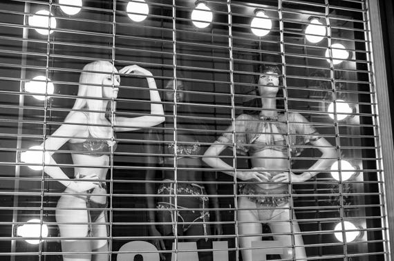 Exposed – Fine Art Street Photography, The Glass Between Series, Limited Edition Black and White Film Print