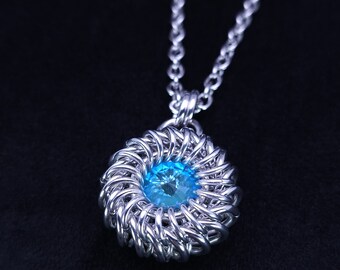 Bright aluminum Whirlybird chainmaille pendant with Laguna Delite crystal