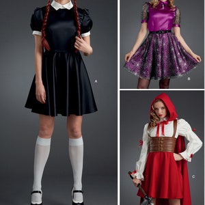 May include: A sewing pattern for three different Halloween costumes. The first costume is a black dress with a white collar and white socks. The second costume is a purple dress with a black spiderweb pattern and a witch's hat. The third costume is a red dress with a brown belt and a red hooded cape.