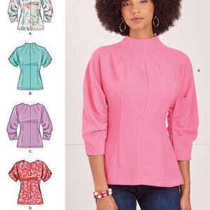 May include: A sewing pattern for a women's blouse with four different variations. The pattern includes a floral print, a light blue, a purple, and a red floral print. The pattern is designed and printed in the USA.