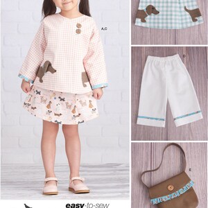 May include: A sewing pattern for a girl's outfit with a pink and white gingham top, a skirt with a dog print, white pants, a blue and white gingham skirt, and a brown purse with a blue and white ruffle. The pattern is called "Ruby Jean's Closet easy-to-sew" and is designed and printed in the USA.