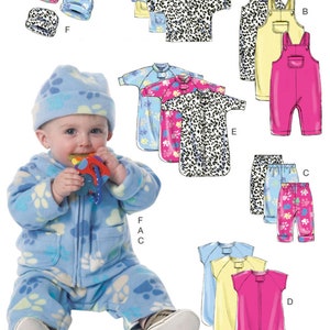 May include: Sewing pattern for baby clothes, including a hooded jacket, overalls, pajamas, and a hat. The pattern includes a variety of styles and designs, such as leopard print, paw prints, and floral patterns. The pattern is for sizes 0-3 months.