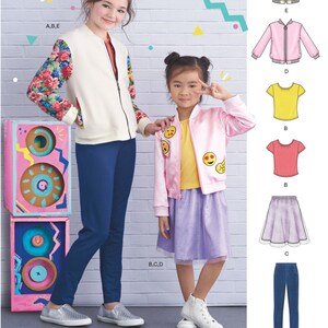 May include: A sewing pattern for a bomber jacket, skirt, and t-shirt. The pattern includes instructions for making a floral-print bomber jacket, a pink bomber jacket, a yellow t-shirt, a pink t-shirt, a purple skirt, and blue jeans. The pattern is for sizes A, B, C, D, and E.