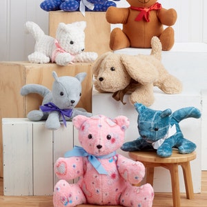 May include: Sewing pattern for making plush toys. The pattern includes a blue polka dot dog, a brown teddy bear, a white cat, a beige dog, a gray cat, a pink teddy bear, and a blue and white dog.