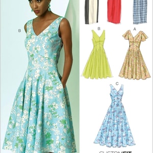 May include: Sewing pattern for a dress with a V-neckline and a variety of sleeve options. The pattern includes a sleeveless option, a short-sleeve option, a long-sleeve option, and a flutter-sleeve option. The pattern is available in sizes for A, B, C, and D cup sizes.  "CUSTOMFIT for A,B,C,D cup sizes" is printed on the pattern.
