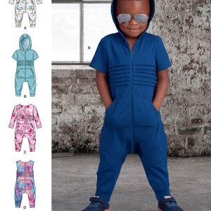 May include: A sewing pattern for a hooded jumpsuit with a zipper closure. The pattern includes four different styles: a long-sleeved jumpsuit with a fox print, a short-sleeved jumpsuit in a solid blue color, a long-sleeved jumpsuit with a pink heart print, and a sleeveless jumpsuit with a tie-dye print. The pattern is designed and printed in the USA.