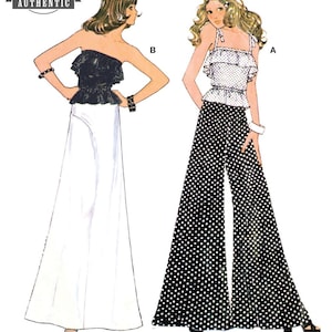 Op de afbeelding: Een vintage 70's naaipatroonillustratie met twee outfits. Outfit B toont een zwarte strapless top met ruches en een lange witte rok. Outfit A toont een witte top met stippen en ruches, gecombineerd met een bijpassende broek met wijde pijpen.