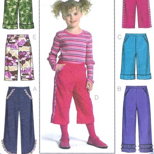 May include: Sewing pattern for girls' pants. The pattern includes six different styles of pants, including denim, corduroy, and patterned fabric. The pattern is for sizes 2-14.
