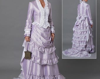 May include: A lavender Victorian era dress with a matching hat. The dress features a ruffled skirt, long sleeves, and white lace trim. A smaller image shows the back of the dress. The text at the bottom says "Listing is for sewing pattern only."