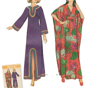 May include: Vintage 1970s sewing pattern for two long dresses. One dress is purple with a slit up the front and gold trim. The other dress is red with a floral print and a V-neck.