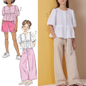 May include: Illustration of girls' clothing patterns. One girl wears a pink floral top and shorts, another wears a white top and pink trousers, and the third wears a white top and beige trousers. The text at the bottom says "Listing is for sewing pattern only."